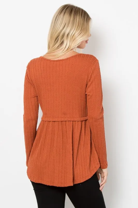 Rust Full Size Texture Babydoll Round Neck Long Sleeve Knit Top